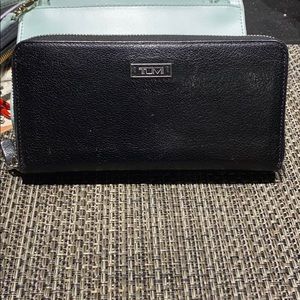 Tumi zip around wallet black leather